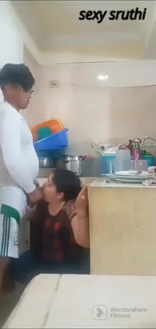 Giving blowjob to young devar in kitchen