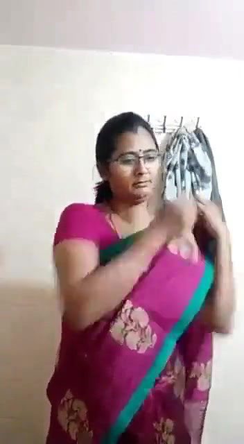 Beautiful chasmish bhabhi removing sari in bathroom
