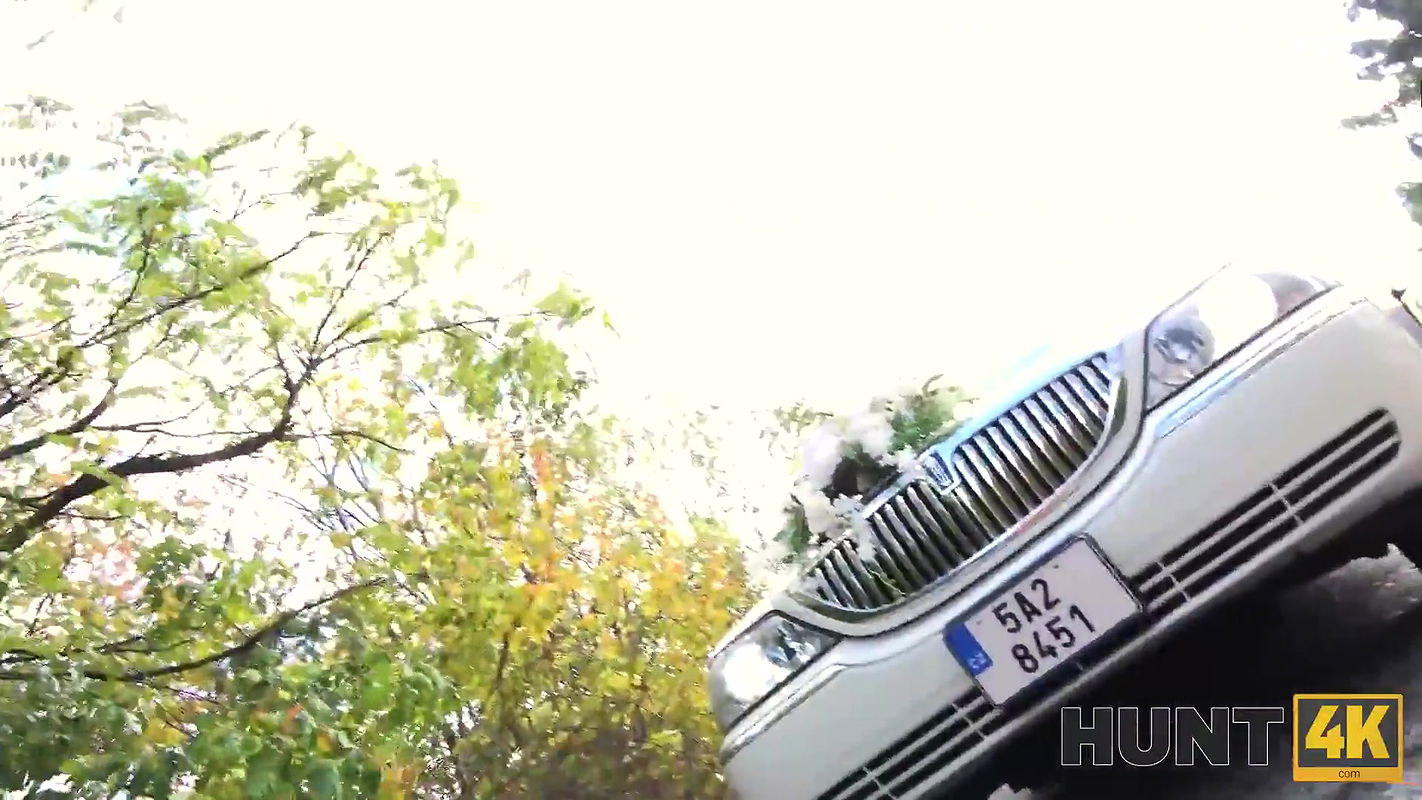 Excited girl in wedding dress fools around not with future hubby