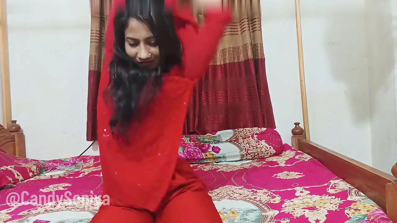 Beautiful girl taking cucumber