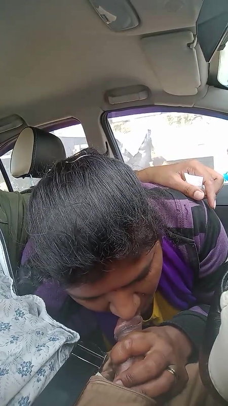 Giving blowjob inside car