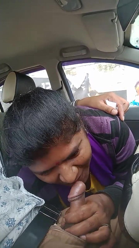 Giving blowjob inside car