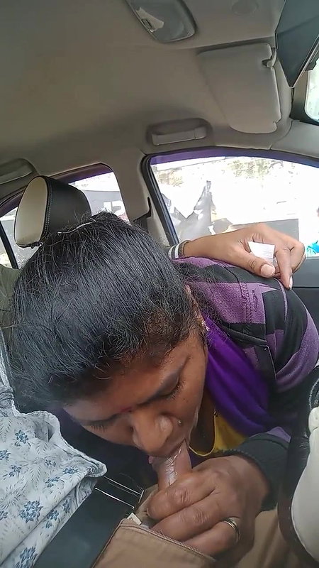 Giving blowjob inside car