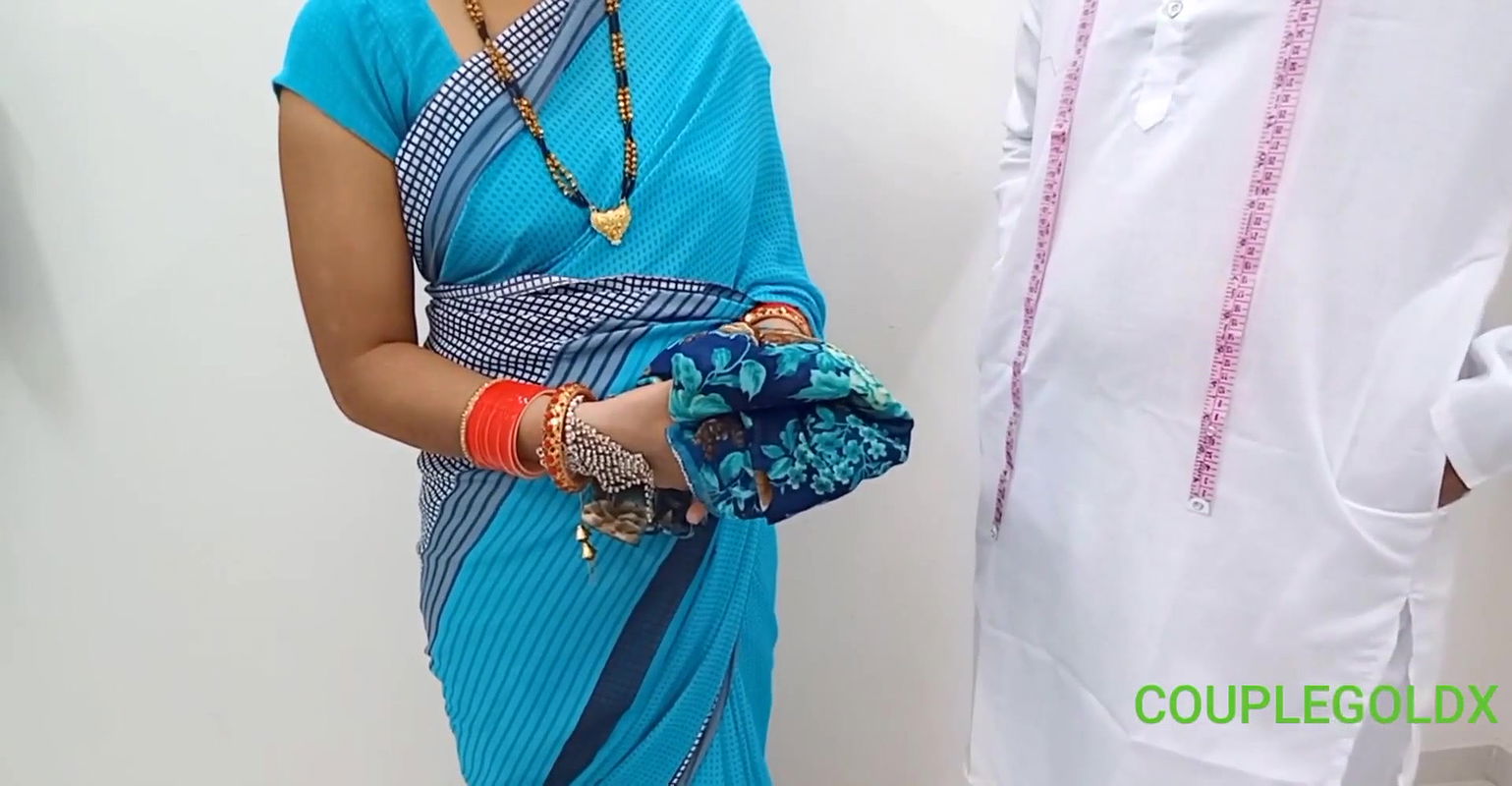 Helping Indian girl to stick her bloose