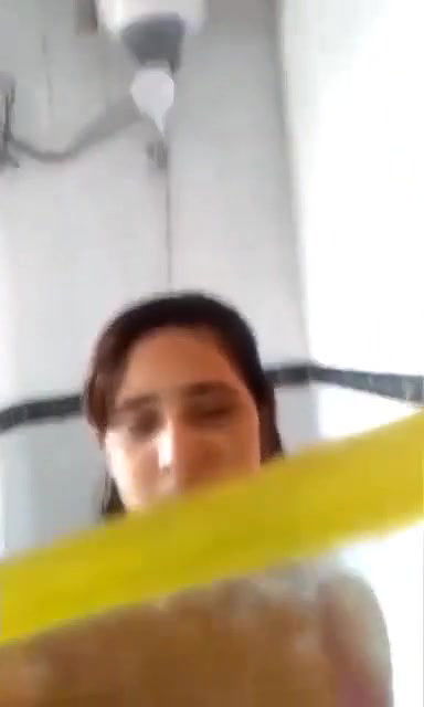 Young maal in bathroom