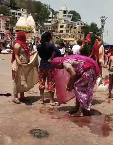 Aunty Lifting Saree Outdoor Captured Hidenly