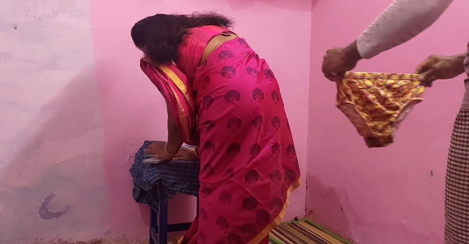 Aunty was bending down and reading something and I was playing with her panties behind her and she saw that I had sex with her