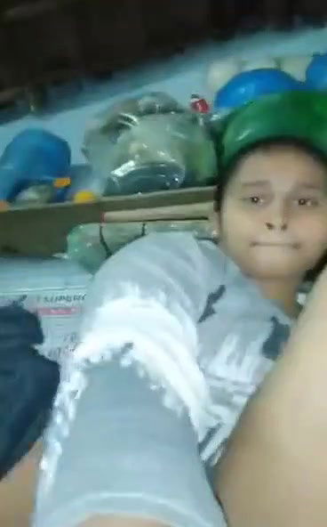 Young village girl taking carrot