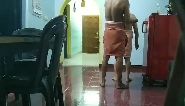 Mature couple having in standing position