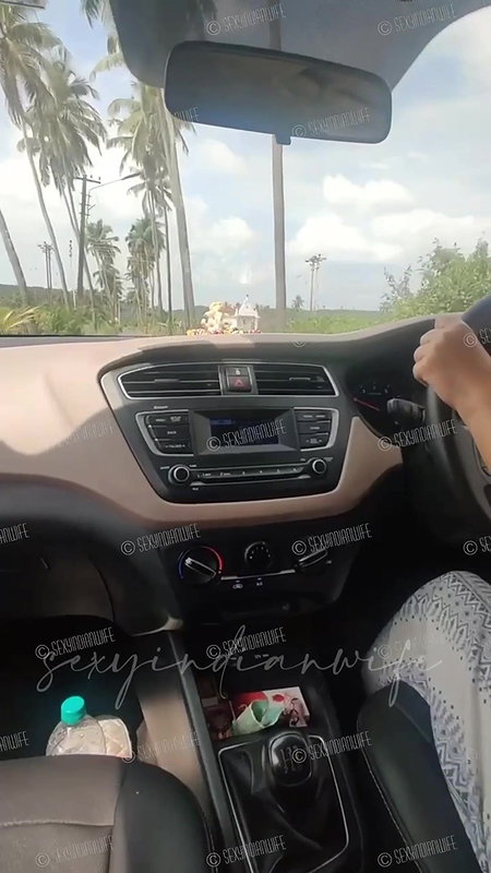 Sexy indian wife showing bOObs while driving car