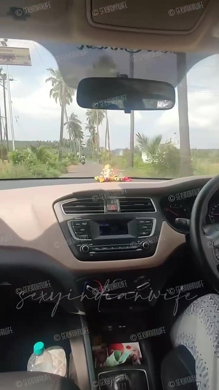 Sexy indian wife showing bOObs while driving car
