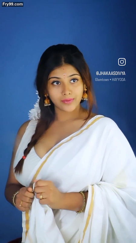 Busty desi girl huge tits in white saree