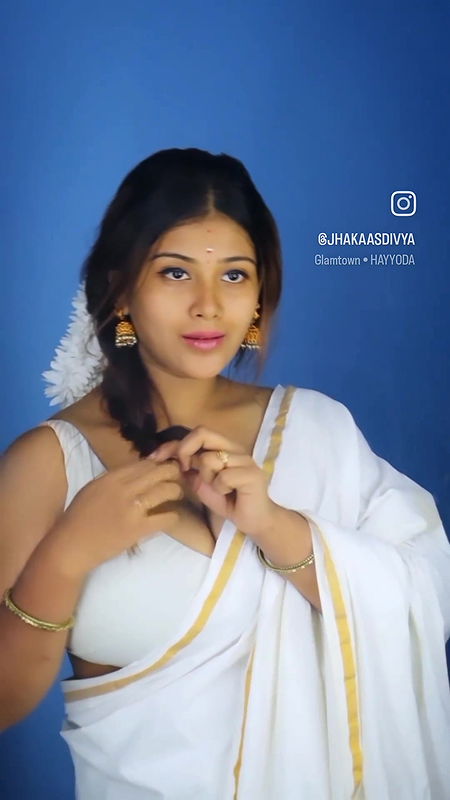 Busty desi girl huge tits in white saree