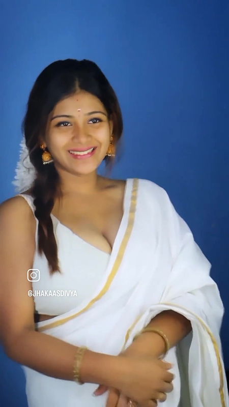 Busty desi girl huge tits in white saree