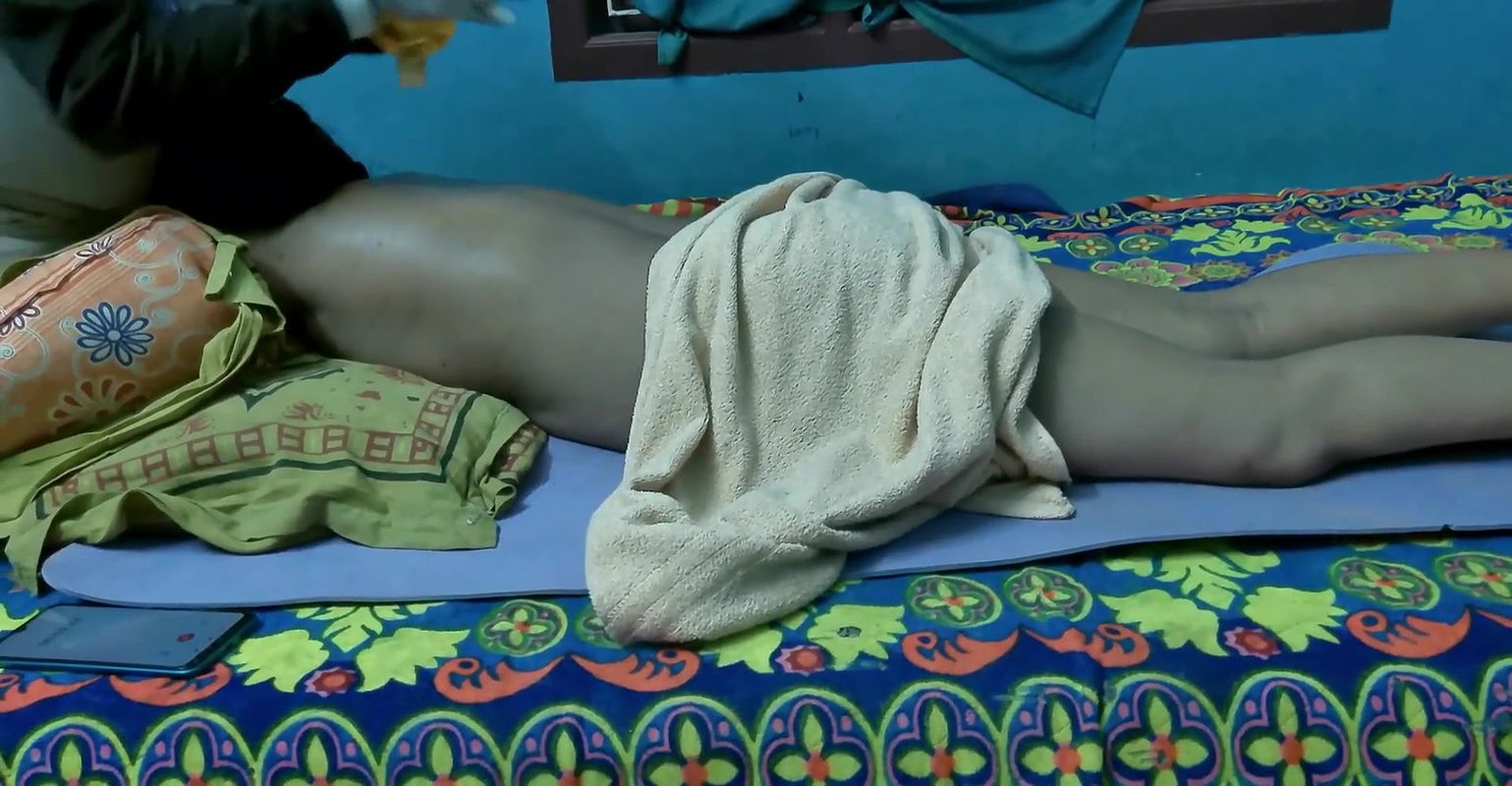 Tamil housewife doing massage at home