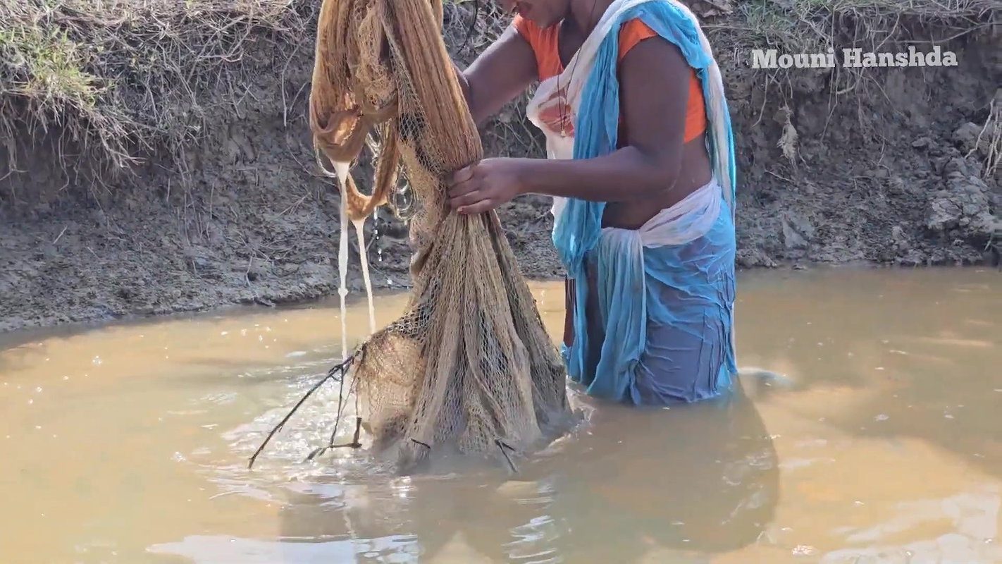 Amazing Village Women Net Fishing in Muddy Water
