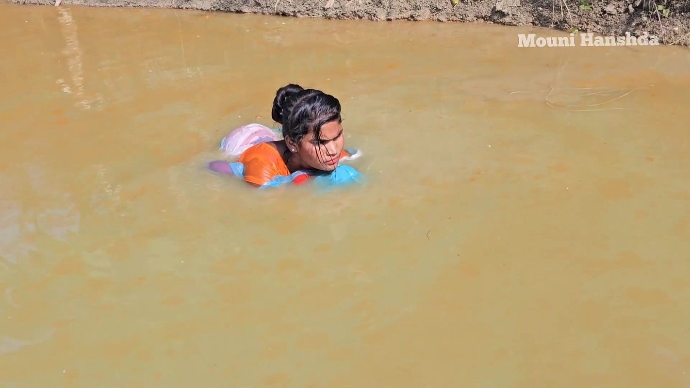 Amazing Village Women Net Fishing in Muddy Water