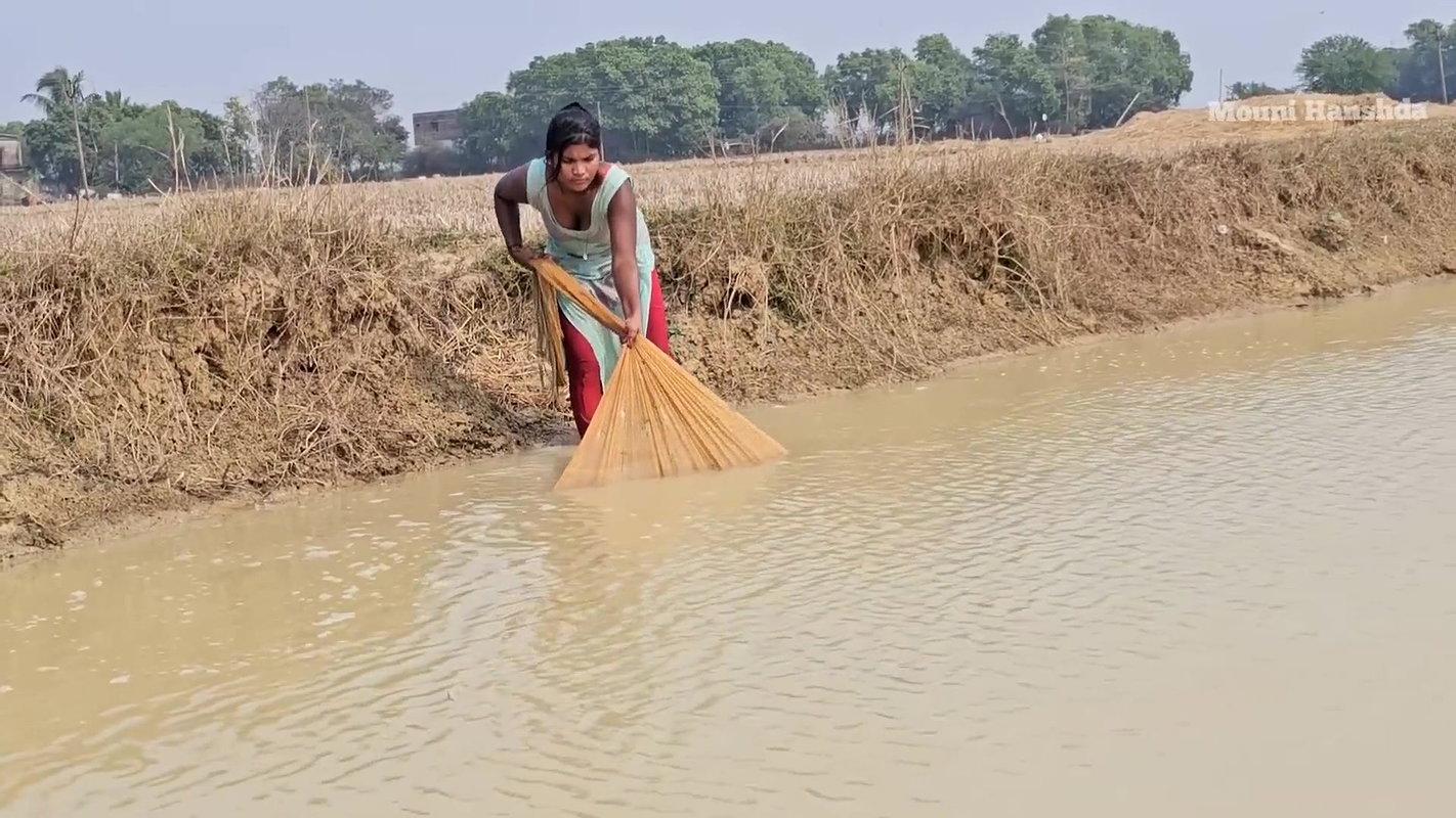 Incredible Village Women net fishing in Pon