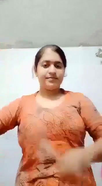 Big boobs removing suit and showing melons