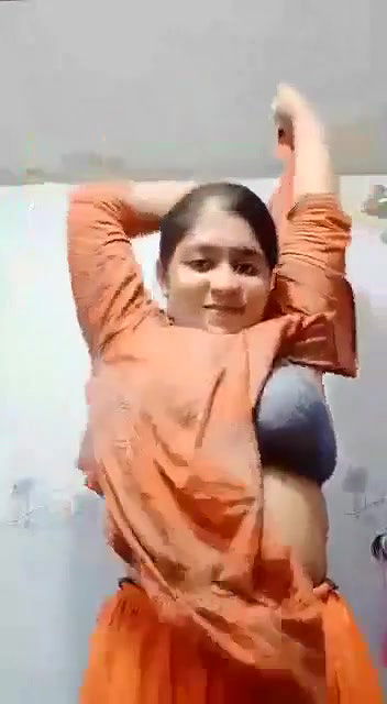 Big boobs removing suit and showing melons