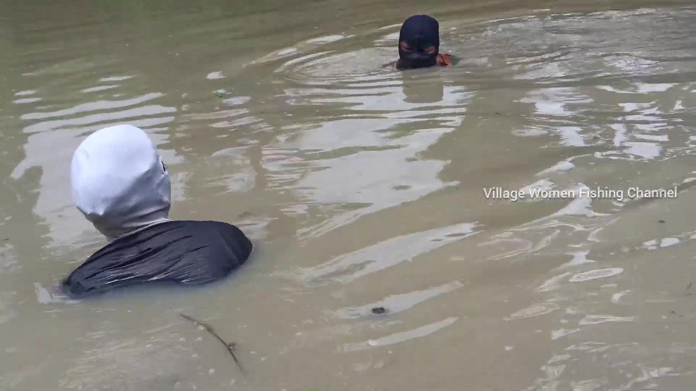 Amazing Masked Village Women fishing in the Rain