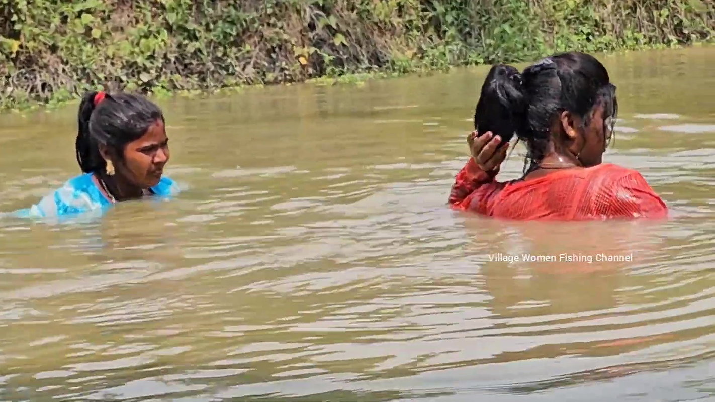 Amazing Mom and Daughter Fishing in Village pond