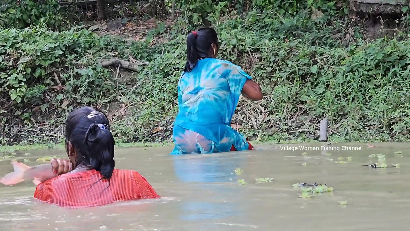 Amazing Mom and Daughter Fishing in Village pond