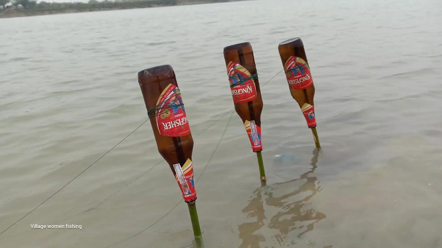 Amazing Village Lady Fishing with Beer Bottle   Vi