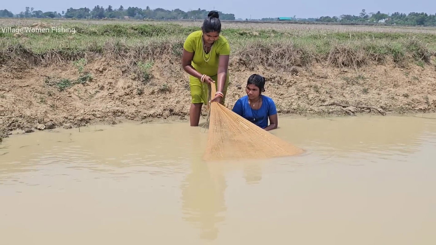 Amazing Village Women Net Fishing in Muddy Water