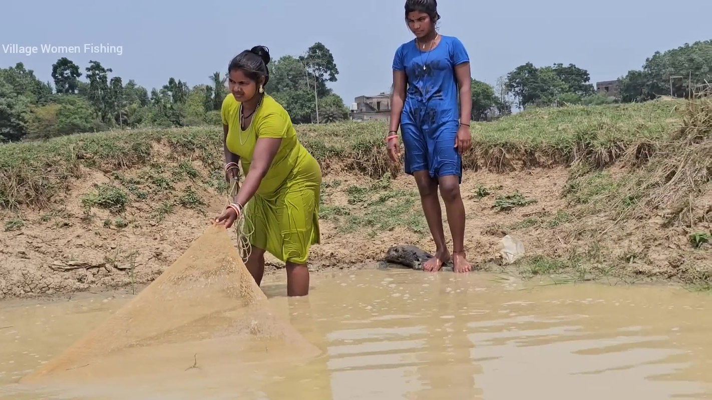 Amazing Village Women Net Fishing in Muddy Water