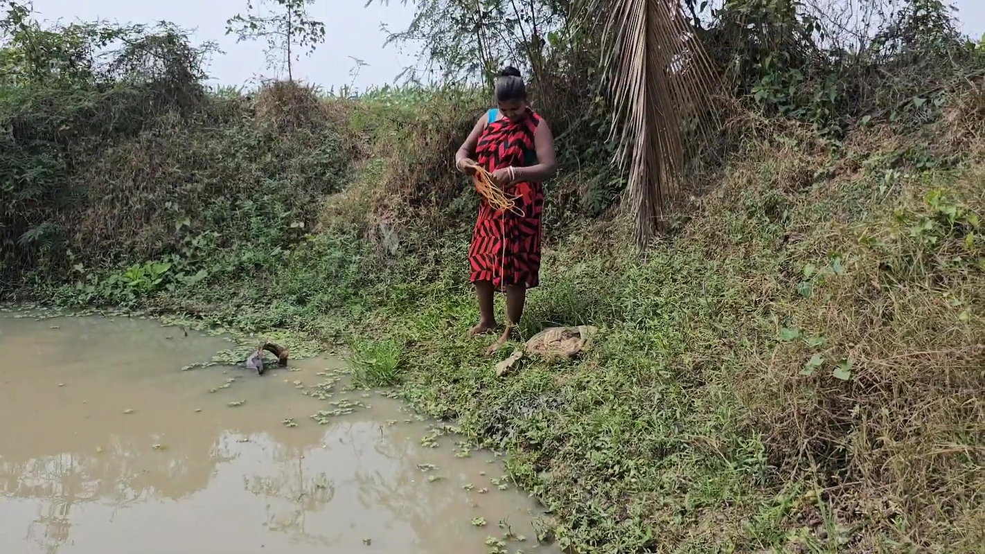 x Incredible Village Women Fishing in Village pond