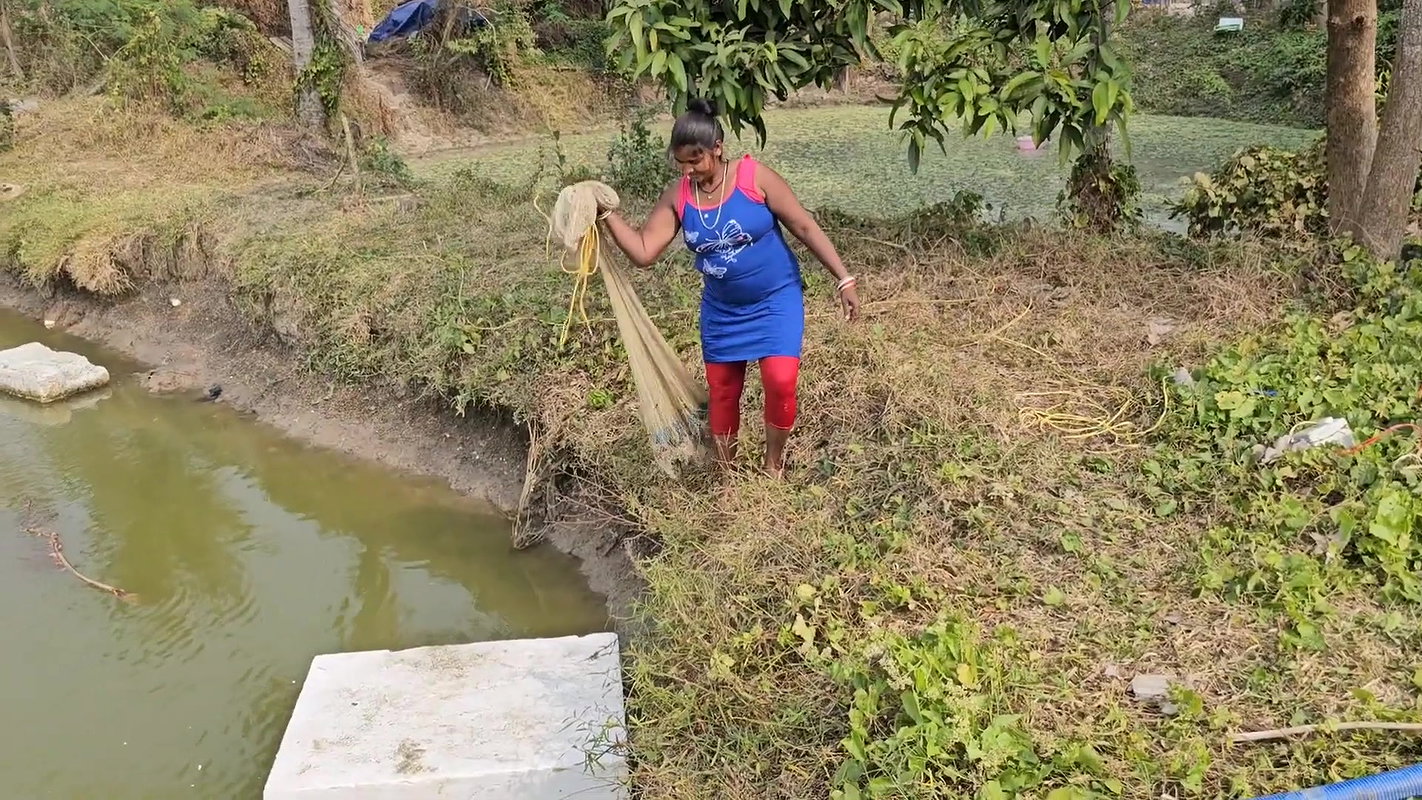 Mouni Fishing in Village pond floating on a Thermo