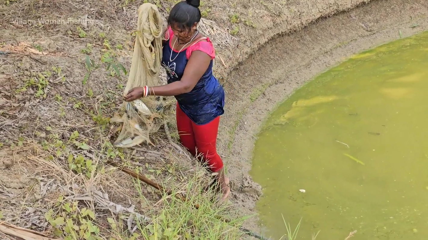 Mouni Fishing in Village pond floating on a Thermo