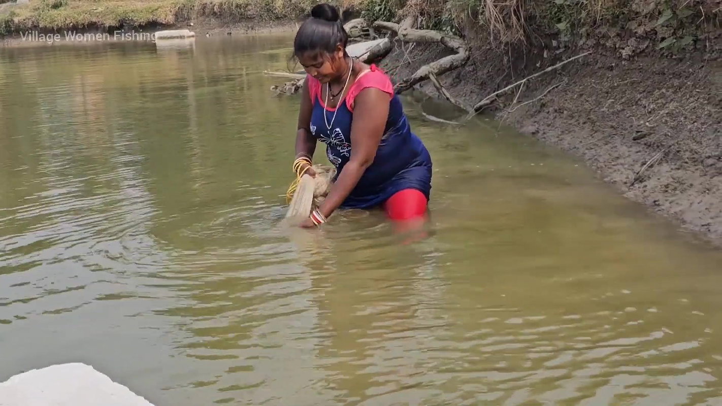 Mouni Fishing in Village pond floating on a Thermo
