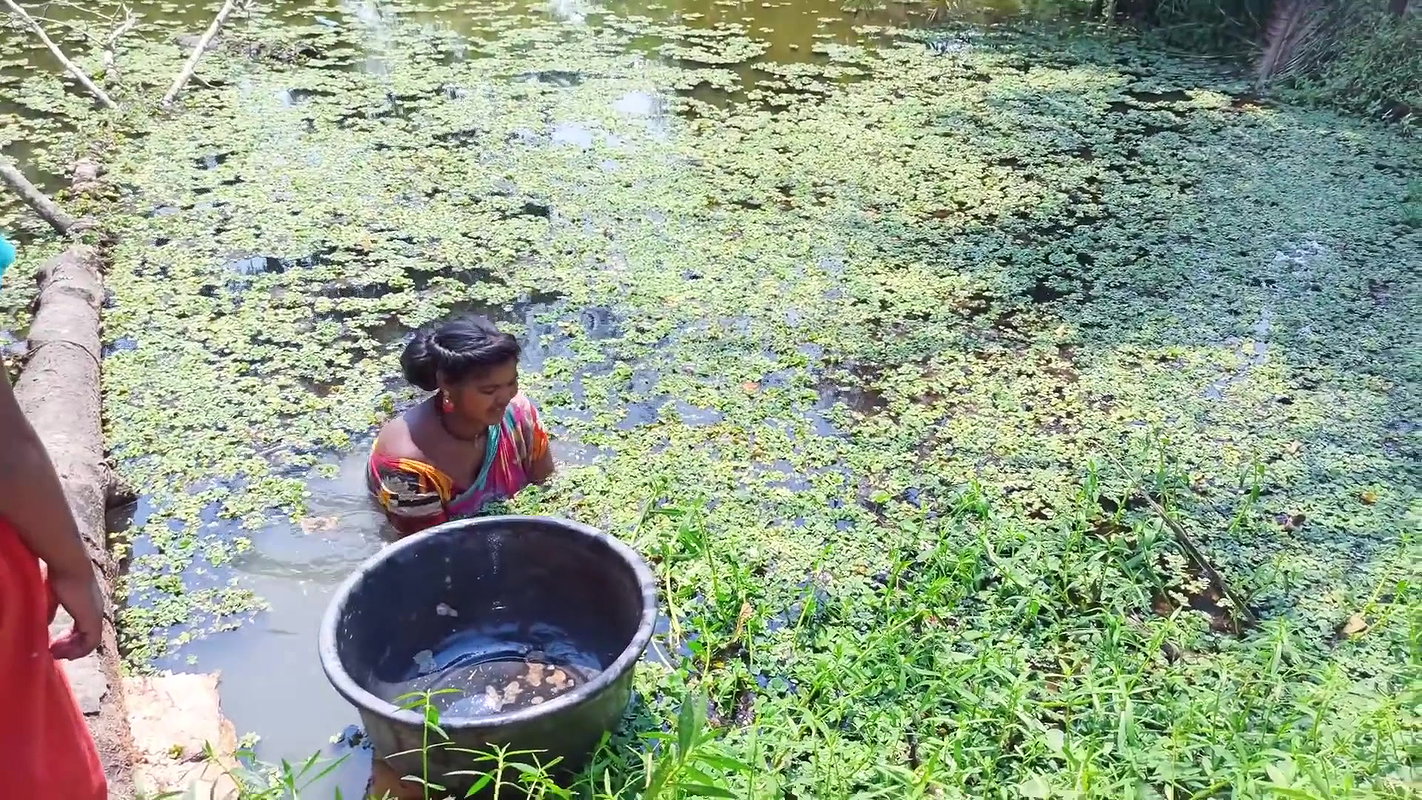 Traditional Hand Fishing by Village Women