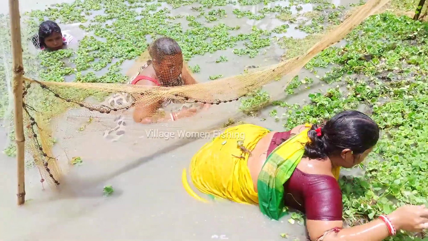 Unique Village women fishing technique   Mud water