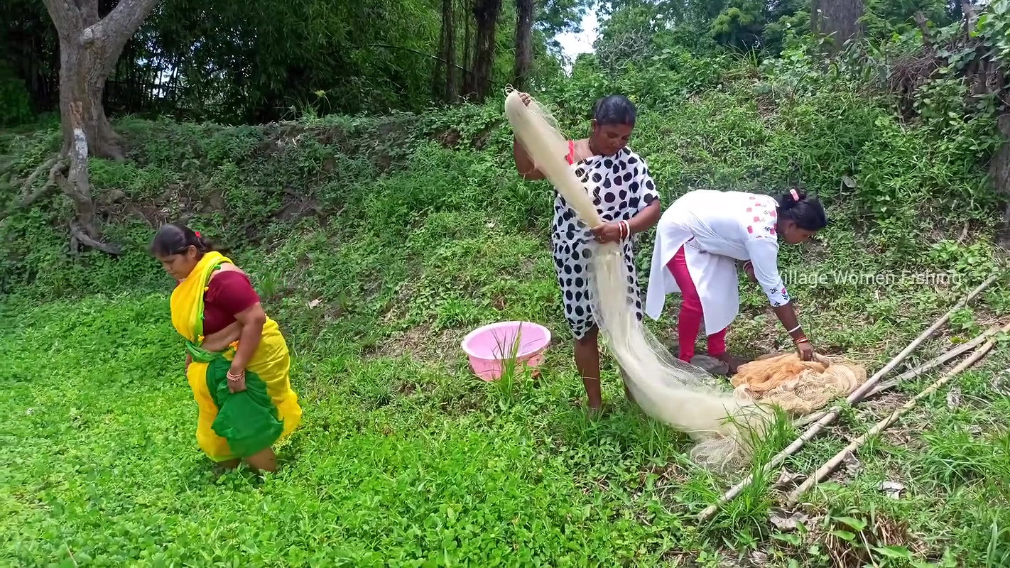 Unique Village women fishing technique   Mud water