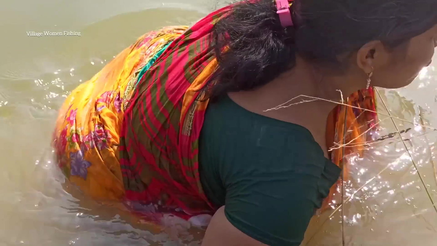 xVillage Women Catching and Cooking Fish village st