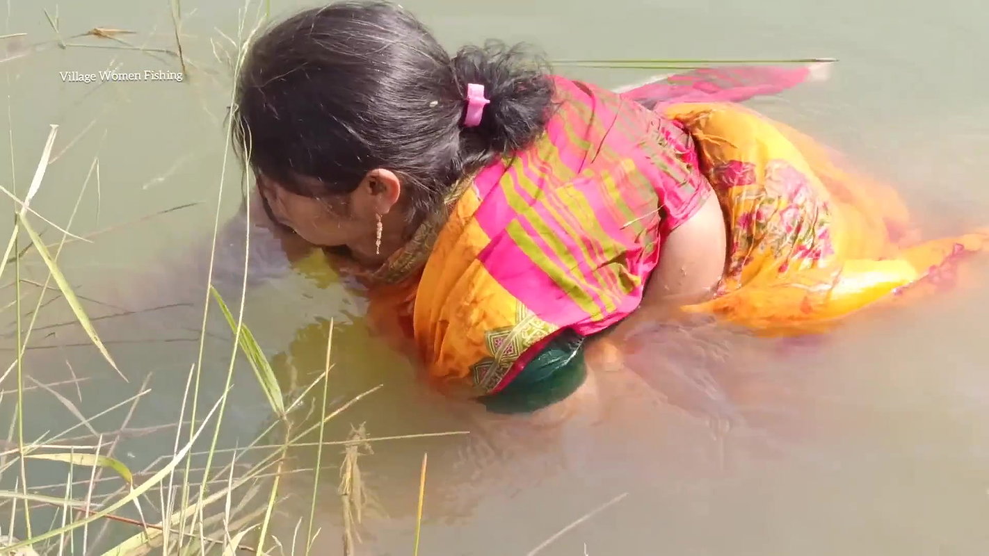 xVillage Women Catching and Cooking Fish village st
