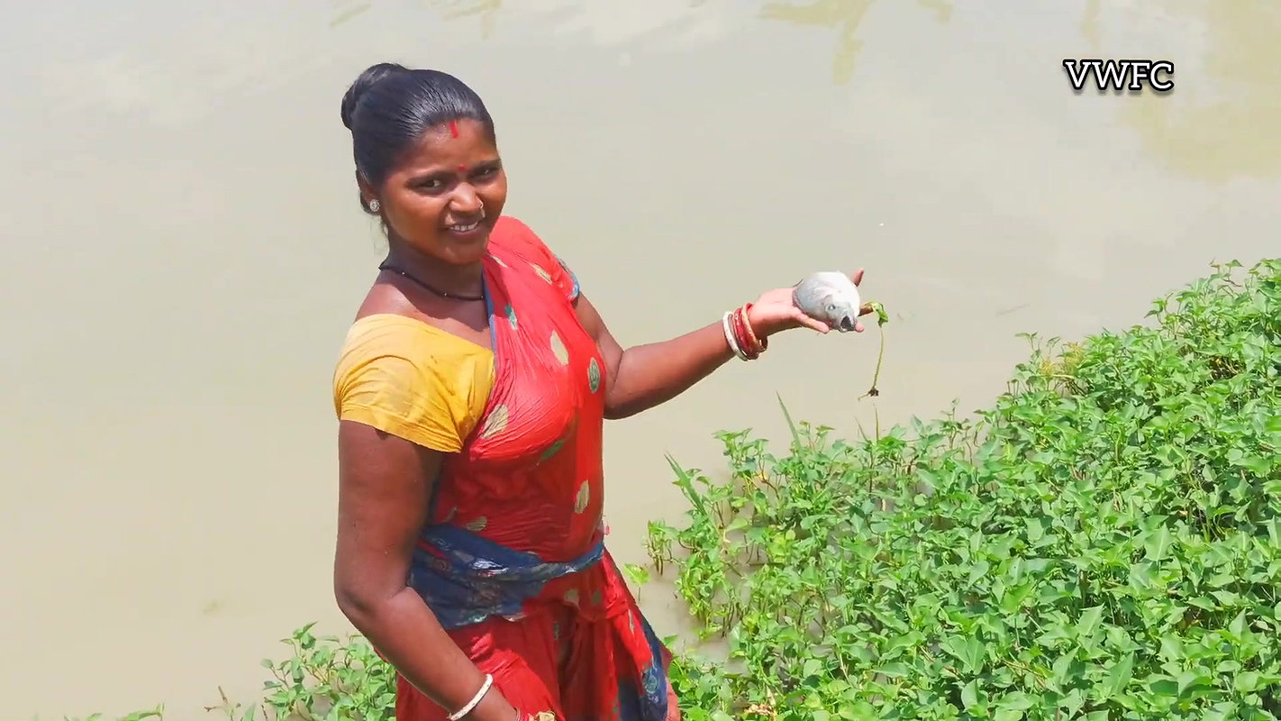 x  Village Women fishing    Traditional Net fishing