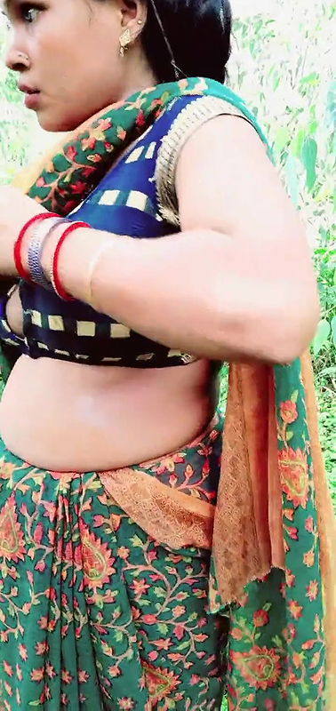 It was rainy season and sister-in-law was . Both of them went out and had sex in the garden. w’s