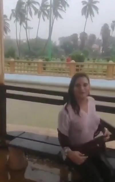 Desi Bhabhi in REsort Dancing in Rain showing her boobs