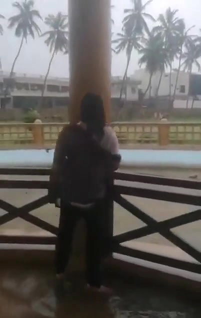 Desi Bhabhi in REsort Dancing in Rain showing her boobs