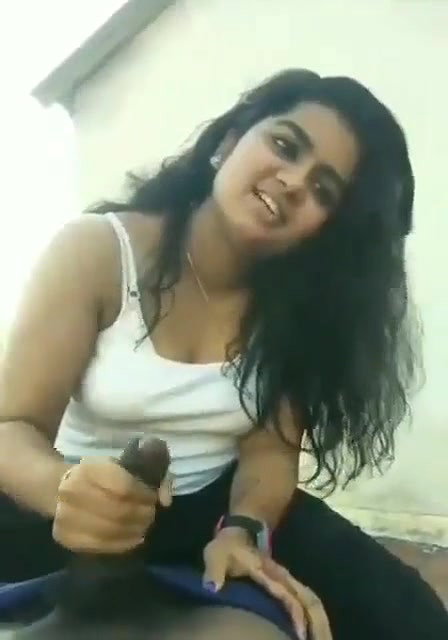 Cute and beautiful girl giving handjob