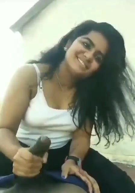 Cute and beautiful girl giving handjob