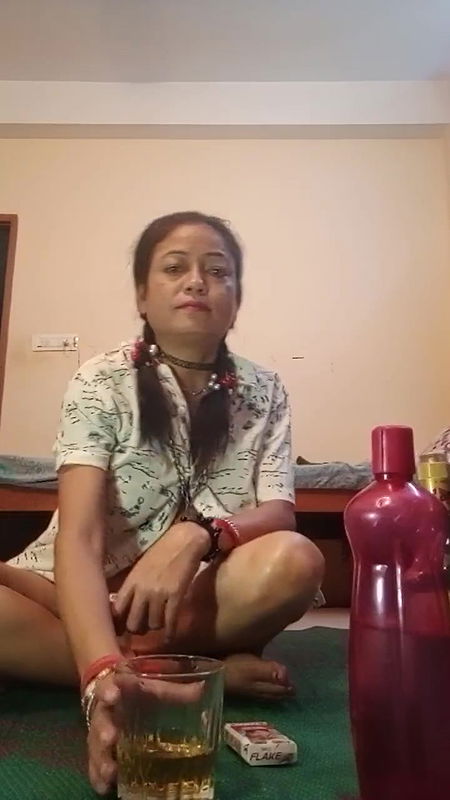 Village aunty drink alcohol Smoke cigarette fingering her pushy,boobs,nippal