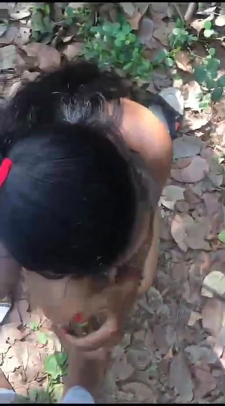 Cutie giving blowjob in jungle