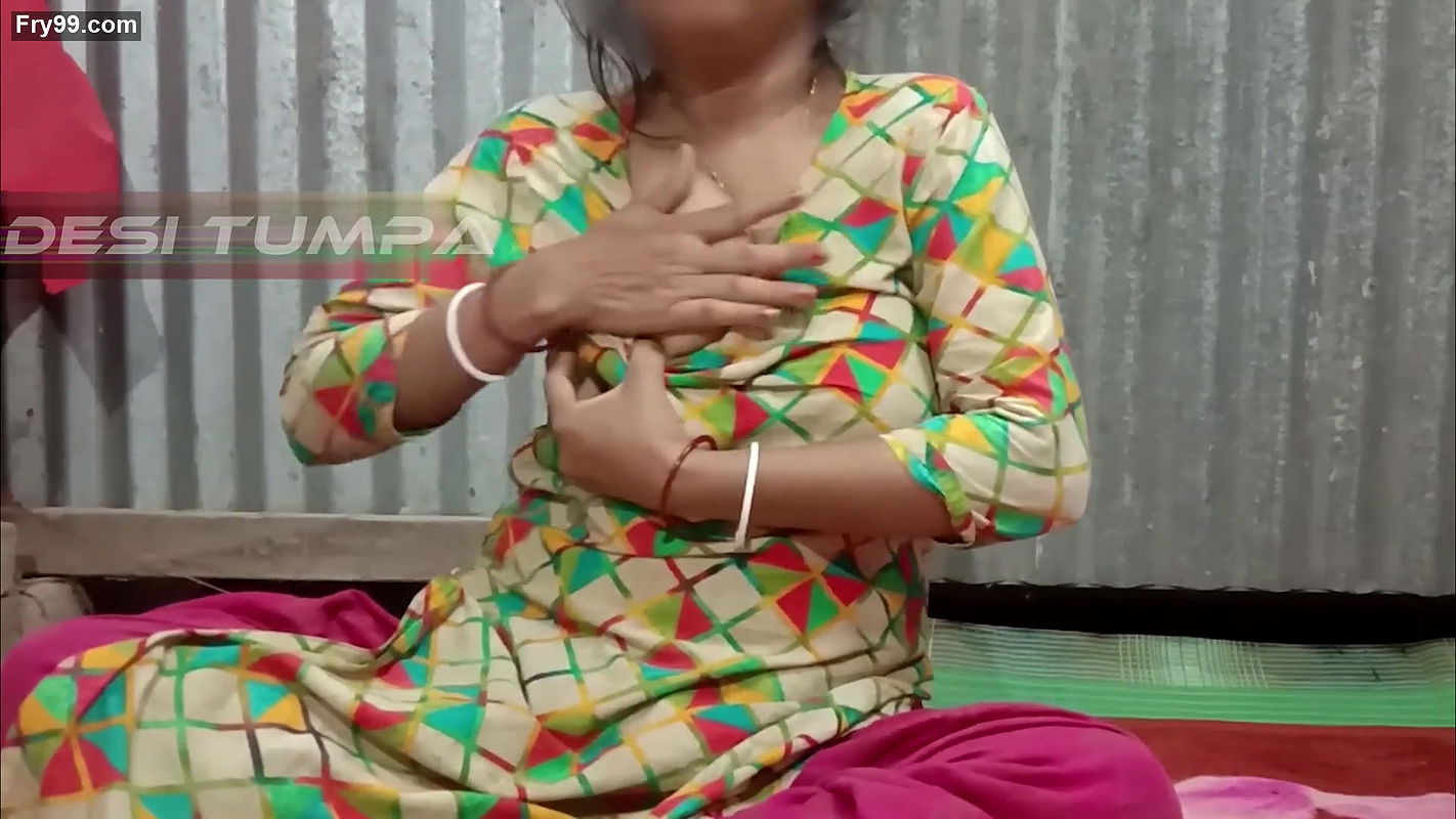 Desi Tumpa bhabhi shows her big white boobs and creamy tight pussy when her husband is not in the room