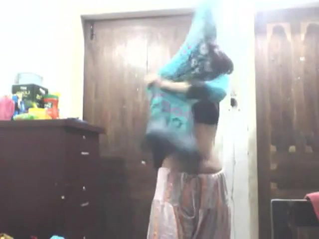 bengali girl in shalwar suit striping and trying dresses