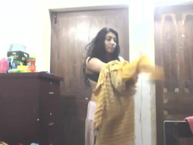 bengali girl in shalwar suit striping and trying dresses